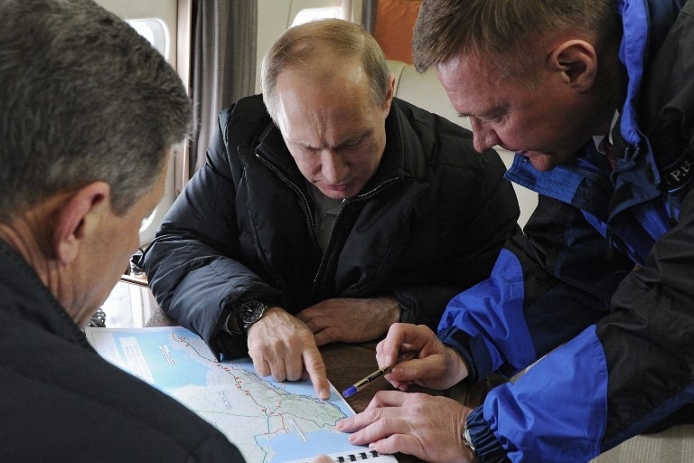 Roman Starovoit junto a Vladimir Putin