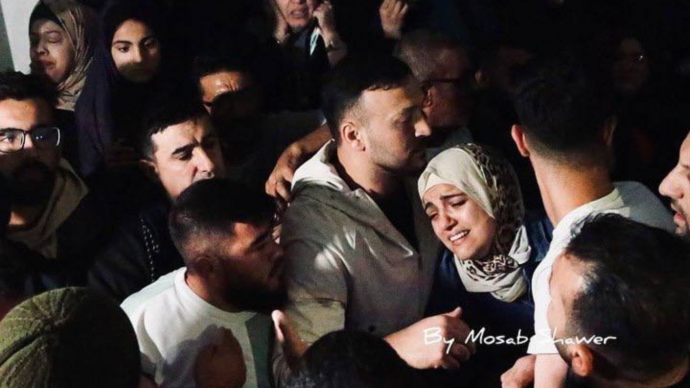 La madre del niño palestino Muhammad al-Hallaq durante su funeral.
